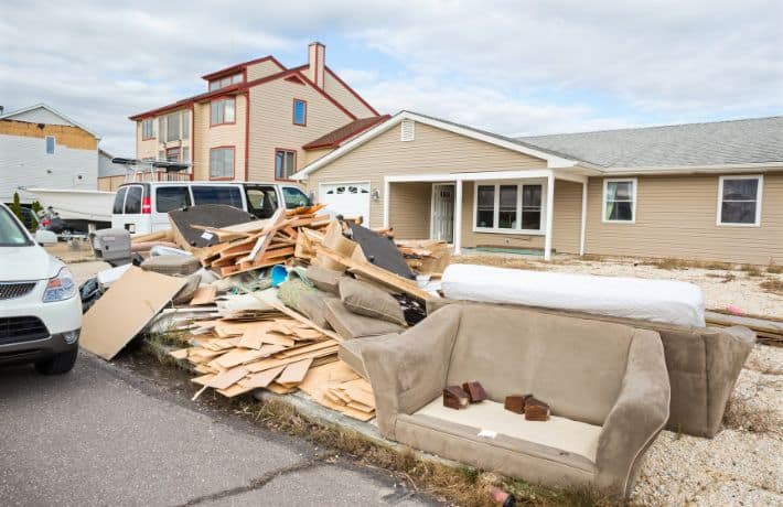 Couches and debris piled up outside homes following Hurricane Sandy
