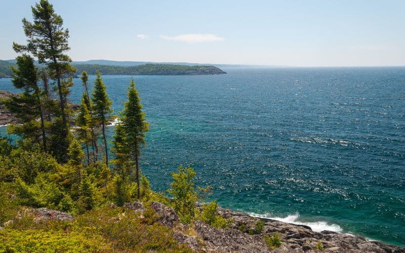 Lake Superior shoreline with trees along left side